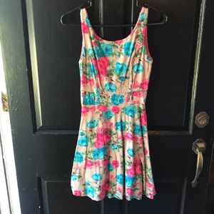 Tan mini dress with pink, blue and green flowers